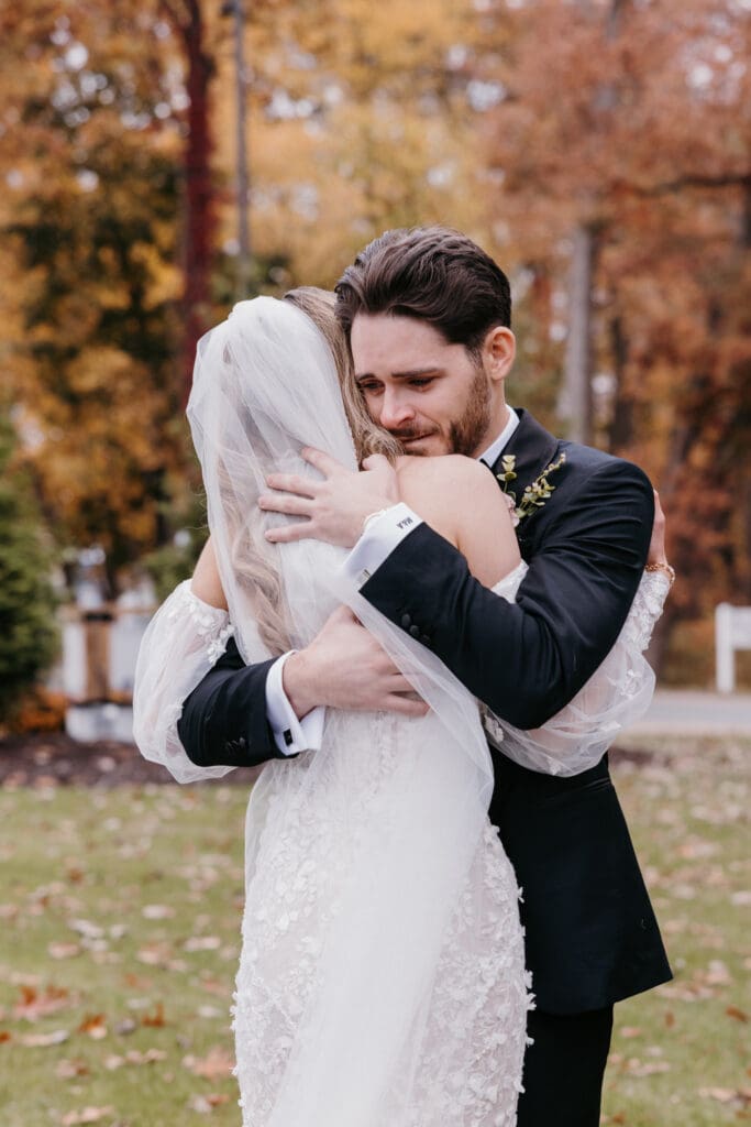 Bride and groom seeing each other for the first time before their Michigan wedding ceremony